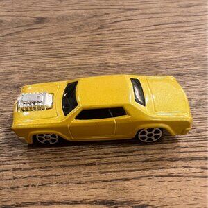 Yellow Diecast Toy Car With Silver Engine & Black Windows Made By Maisto